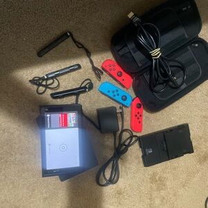 Nintendo Switch with Red and Blue Joy-Con Controllers